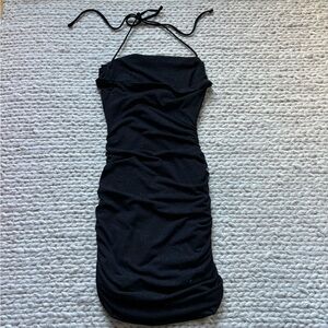 “Under My Spell” Glitter Halter Black Mini Dress